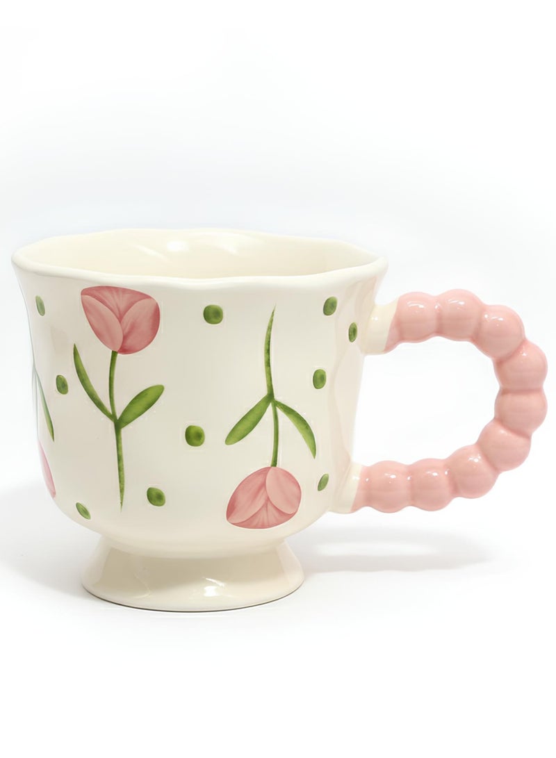 Elegant ceramic mug in a creamy color with pink floral patterns and green branches, 400 ml capacity, stable base, and a comfortable handle for everyday use. - Image 1